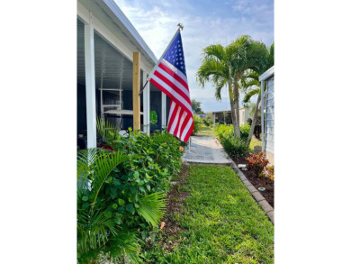 Welcome to your dream home in a picturesque setting located at on Bird Bay Executive Golf Club in Florida - for sale on GolfHomes.com, golf home, golf lot