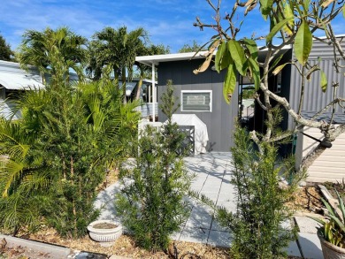 Welcome to your dream home in a picturesque setting located at on Bird Bay Executive Golf Club in Florida - for sale on GolfHomes.com, golf home, golf lot