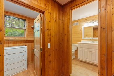 Tucked behind the gates of the Country Club of Sapphire Valley on The Country Club of Sapphire Valley in North Carolina - for sale on GolfHomes.com, golf home, golf lot