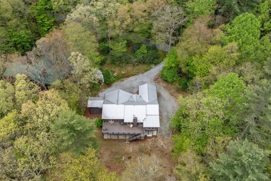 Tucked behind the gates of the Country Club of Sapphire Valley on The Country Club of Sapphire Valley in North Carolina - for sale on GolfHomes.com, golf home, golf lot
