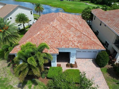 Step into luxury living in the heart of Lake Nona's prestigious on Eagle Creek Golf Club in Florida - for sale on GolfHomes.com, golf home, golf lot