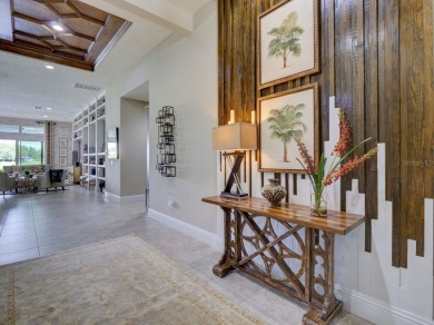 Step into luxury living in the heart of Lake Nona's prestigious on Eagle Creek Golf Club in Florida - for sale on GolfHomes.com, golf home, golf lot