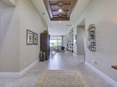 Step into luxury living in the heart of Lake Nona's prestigious on Eagle Creek Golf Club in Florida - for sale on GolfHomes.com, golf home, golf lot