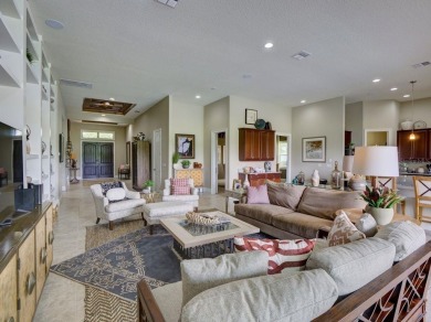 Step into luxury living in the heart of Lake Nona's prestigious on Eagle Creek Golf Club in Florida - for sale on GolfHomes.com, golf home, golf lot