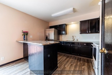 Welcome home to this beautiful 4-bedroom, 2-bath property on Indianhead Golf Club in Nebraska - for sale on GolfHomes.com, golf home, golf lot