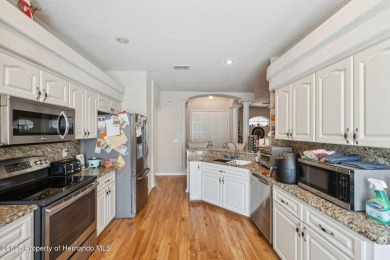 Welcome to your dream home nestled in the prestigious gated on Silverthorn Country Club in Florida - for sale on GolfHomes.com, golf home, golf lot