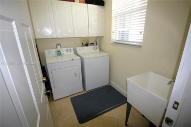 Enjoy breathtaking private sunset views from your screened patio on Ironhorse Country Club in Florida - for sale on GolfHomes.com, golf home, golf lot