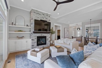 This 4-bedroom, 4-bath reverse 1.5-story is packed with upgrades on Heritage Park Golf Course in Kansas - for sale on GolfHomes.com, golf home, golf lot