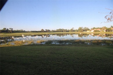 Enjoy breathtaking private sunset views from your screened patio on Ironhorse Country Club in Florida - for sale on GolfHomes.com, golf home, golf lot