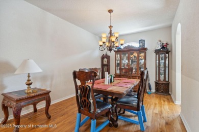 Welcome to your dream home nestled in the prestigious gated on Silverthorn Country Club in Florida - for sale on GolfHomes.com, golf home, golf lot
