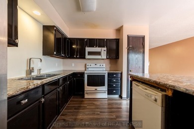 Welcome home to this beautiful 4-bedroom, 2-bath property on Indianhead Golf Club in Nebraska - for sale on GolfHomes.com, golf home, golf lot