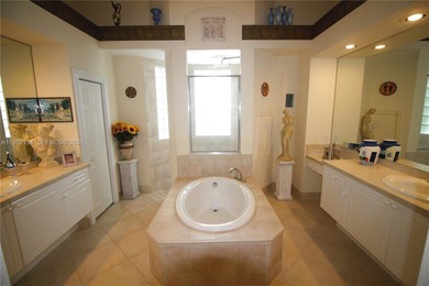 Enjoy breathtaking private sunset views from your screened patio on Ironhorse Country Club in Florida - for sale on GolfHomes.com, golf home, golf lot