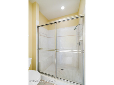 Charming villa in the desirable Viera East Golf Course community on Viera East Golf Club in Florida - for sale on GolfHomes.com, golf home, golf lot