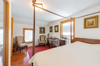 This two bedroom one and a half bath charming farm house built on Grosse Ile Golf and Country Club in Michigan - for sale on GolfHomes.com, golf home, golf lot
