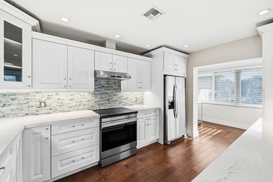 Set in the sought-after Bobwhite neighborhood of Quail Ridge on Quail Ridge Golf Course and Country Club in Florida - for sale on GolfHomes.com, golf home, golf lot