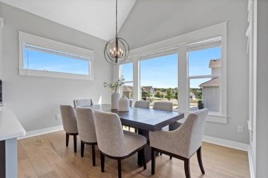 This 4-bedroom, 4-bath reverse 1.5-story is packed with upgrades on Heritage Park Golf Course in Kansas - for sale on GolfHomes.com, golf home, golf lot