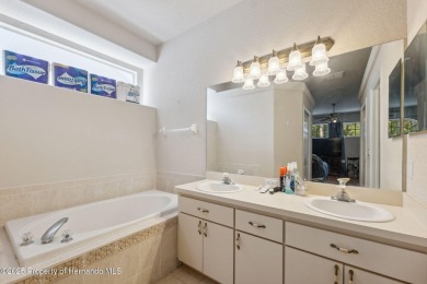 Welcome to your dream home nestled in the prestigious gated on Silverthorn Country Club in Florida - for sale on GolfHomes.com, golf home, golf lot