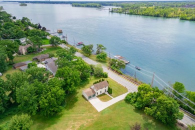 This two bedroom one and a half bath charming farm house built on Grosse Ile Golf and Country Club in Michigan - for sale on GolfHomes.com, golf home, golf lot