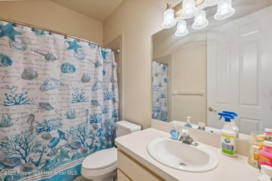 Welcome to your dream home nestled in the prestigious gated on Silverthorn Country Club in Florida - for sale on GolfHomes.com, golf home, golf lot