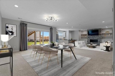 This 4-bedroom, 4-bath reverse 1.5-story is packed with upgrades on Heritage Park Golf Course in Kansas - for sale on GolfHomes.com, golf home, golf lot