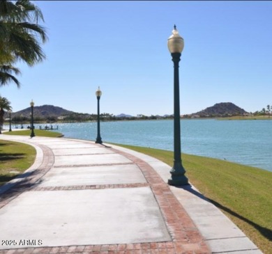 Welcome home! This beautiful move-in-ready, single-story home is on Estrella Mountain Ranch Golf Course in Arizona - for sale on GolfHomes.com, golf home, golf lot