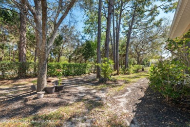 Welcome to your dream home nestled in the prestigious gated on Silverthorn Country Club in Florida - for sale on GolfHomes.com, golf home, golf lot
