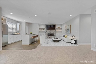 This 4-bedroom, 4-bath reverse 1.5-story is packed with upgrades on Heritage Park Golf Course in Kansas - for sale on GolfHomes.com, golf home, golf lot
