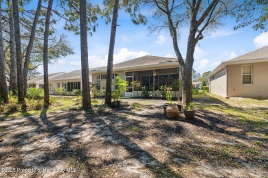 Welcome to your dream home nestled in the prestigious gated on Silverthorn Country Club in Florida - for sale on GolfHomes.com, golf home, golf lot