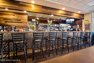 Charming villa in the desirable Viera East Golf Course community on Viera East Golf Club in Florida - for sale on GolfHomes.com, golf home, golf lot