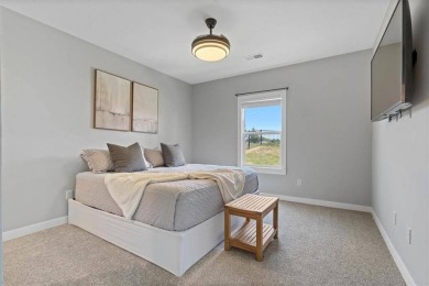 This 4-bedroom, 4-bath reverse 1.5-story is packed with upgrades on Heritage Park Golf Course in Kansas - for sale on GolfHomes.com, golf home, golf lot
