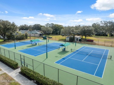 Welcome to your dream home nestled in the prestigious gated on Silverthorn Country Club in Florida - for sale on GolfHomes.com, golf home, golf lot