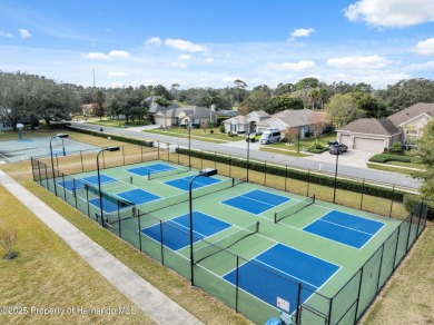 Welcome to your dream home nestled in the prestigious gated on Silverthorn Country Club in Florida - for sale on GolfHomes.com, golf home, golf lot