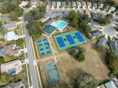 Welcome to your dream home nestled in the prestigious gated on Silverthorn Country Club in Florida - for sale on GolfHomes.com, golf home, golf lot