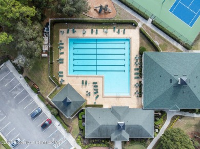 Welcome to your dream home nestled in the prestigious gated on Silverthorn Country Club in Florida - for sale on GolfHomes.com, golf home, golf lot