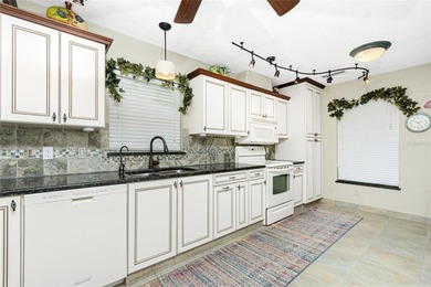 Experience the relaxed Florida lifestyle in this spacious on Kingsway Country Club in Florida - for sale on GolfHomes.com, golf home, golf lot