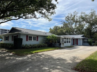 Under contract-accepting backup offers. Clean & Immaculate on Highland Lakes Executive Golf Course in Florida - for sale on GolfHomes.com, golf home, golf lot