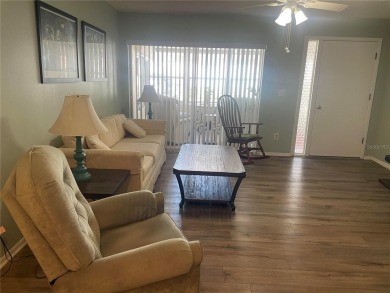 Under contract-accepting backup offers. Clean & Immaculate on Highland Lakes Executive Golf Course in Florida - for sale on GolfHomes.com, golf home, golf lot