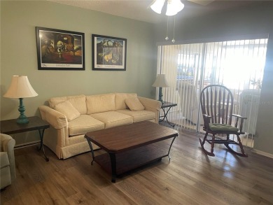 Under contract-accepting backup offers. Clean & Immaculate on Highland Lakes Executive Golf Course in Florida - for sale on GolfHomes.com, golf home, golf lot