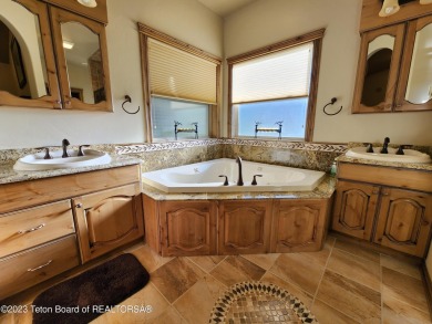 Stunning home centrally located in Star Valley.  Enjoy two 18 on Star Valley RV Golf Course in Wyoming - for sale on GolfHomes.com, golf home, golf lot