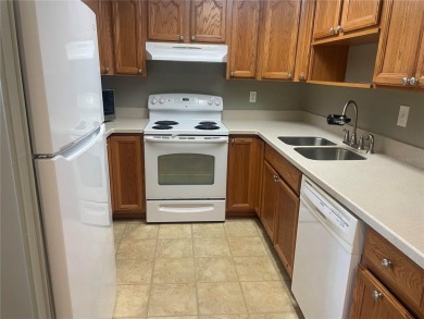 Under contract-accepting backup offers. Clean & Immaculate on Highland Lakes Executive Golf Course in Florida - for sale on GolfHomes.com, golf home, golf lot