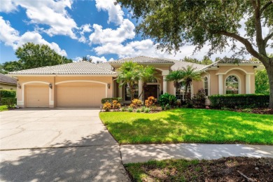 Welcome to this elegant residence in the highly sought-after on Hunters Green Country Club in Florida - for sale on GolfHomes.com, golf home, golf lot