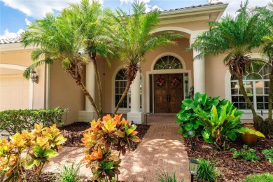 Welcome to this elegant residence in the highly sought-after on Hunters Green Country Club in Florida - for sale on GolfHomes.com, golf home, golf lot