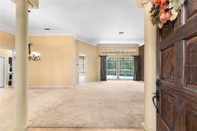 Welcome to this elegant residence in the highly sought-after on Hunters Green Country Club in Florida - for sale on GolfHomes.com, golf home, golf lot