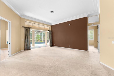 Welcome to this elegant residence in the highly sought-after on Hunters Green Country Club in Florida - for sale on GolfHomes.com, golf home, golf lot