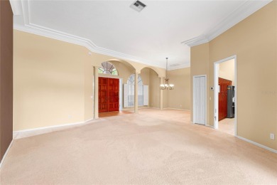 Welcome to this elegant residence in the highly sought-after on Hunters Green Country Club in Florida - for sale on GolfHomes.com, golf home, golf lot