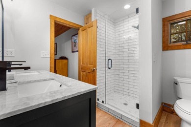 Welcome to an inviting mountain cottage that blends effortless on Trillium Links in North Carolina - for sale on GolfHomes.com, golf home, golf lot