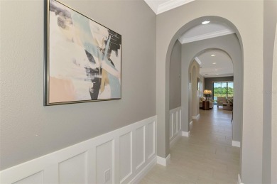 Stunning Waterfront WCI Grand Cayman in Sarasota National Lake on Sarasota National Golf Club in Florida - for sale on GolfHomes.com, golf home, golf lot