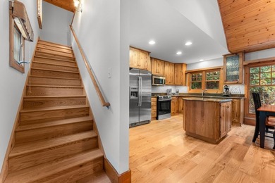 Welcome to an inviting mountain cottage that blends effortless on Trillium Links in North Carolina - for sale on GolfHomes.com, golf home, golf lot