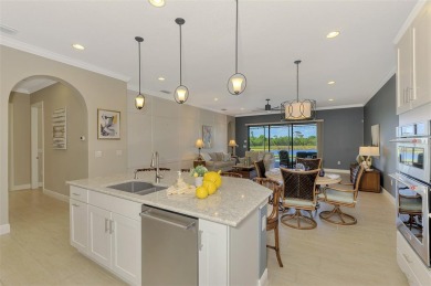 Stunning Waterfront WCI Grand Cayman in Sarasota National Lake on Sarasota National Golf Club in Florida - for sale on GolfHomes.com, golf home, golf lot