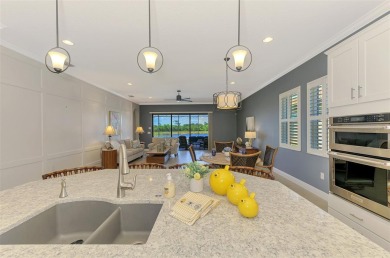 Stunning Waterfront WCI Grand Cayman in Sarasota National Lake on Sarasota National Golf Club in Florida - for sale on GolfHomes.com, golf home, golf lot